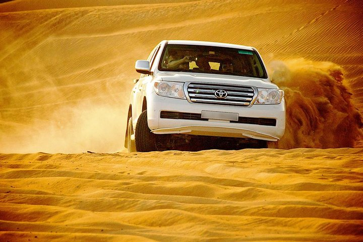 Experience the thrill of speeding through golden dunes where every moment reveals the stunning landscape and the excitement of a true desert adventure awaits. Let the journey unfold.